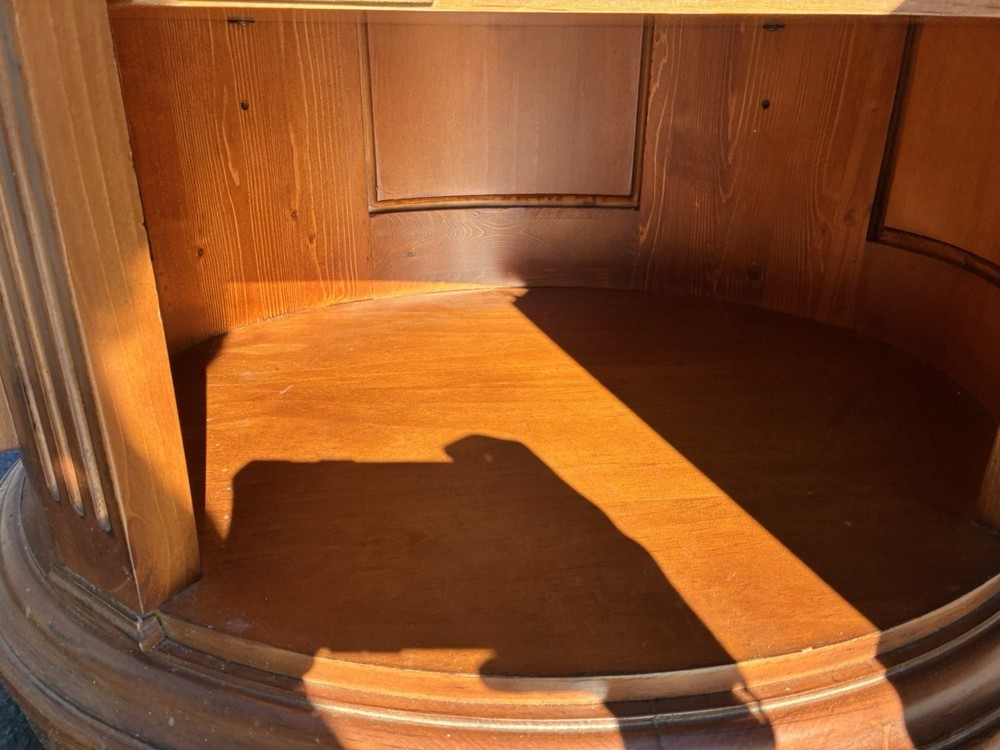 This Ethan Allen Tuscan Oval Cabinet Drum Table