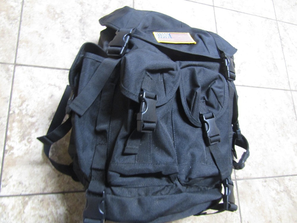TACTICAL BLACK BACKPACK WITH HOOK LOOP US FLAG SNAP AND TIES