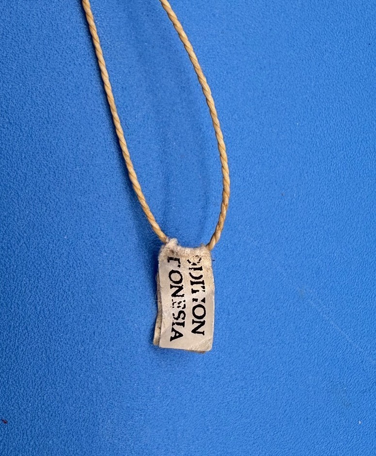 PAINTED METAL "JUMPING JILL" PULL STRING TOY FIGURE