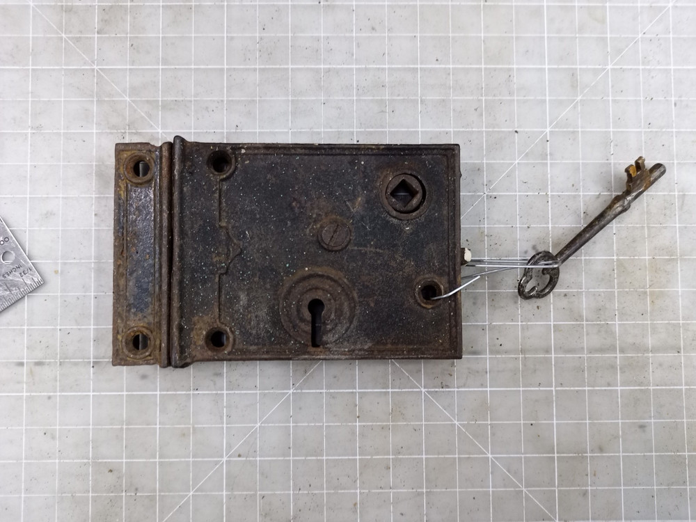 Antique surface mounted cast iron rim lock  3" x 5"