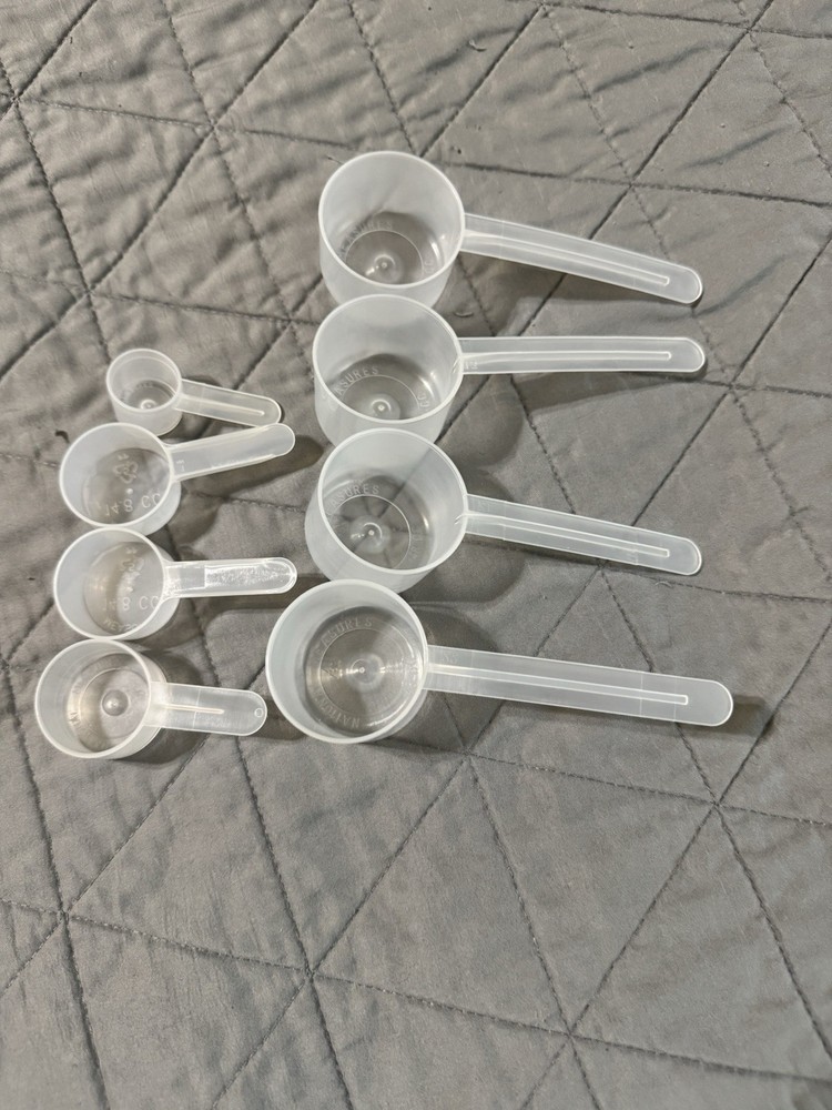 Plastic Measuring Scoops - 8 Total