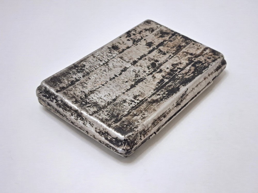 Vintage old metal cigarette case for restoration