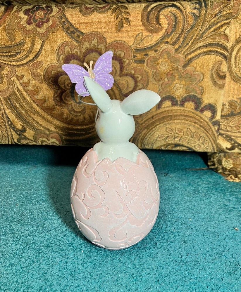 porcelain Bunny in Easter Egg holding butterfly
