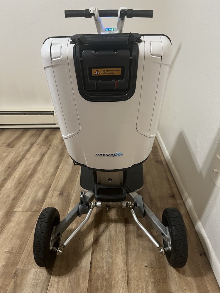 Atto folding scooter color black and white three wheels solid tires