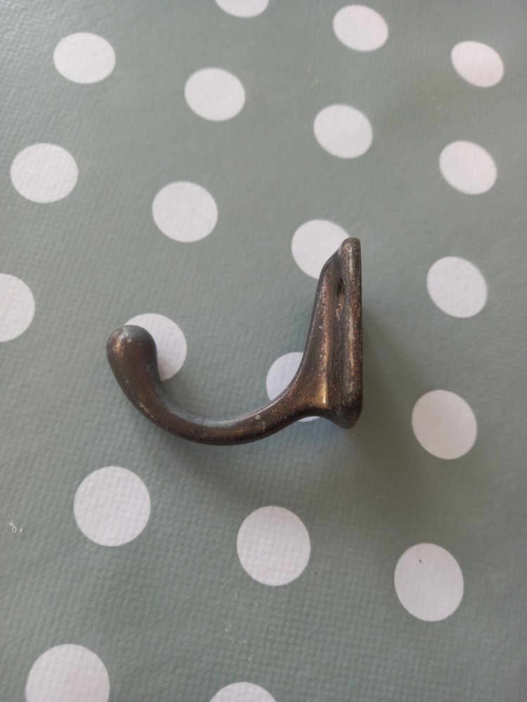 Reclaimed brass coat hooks