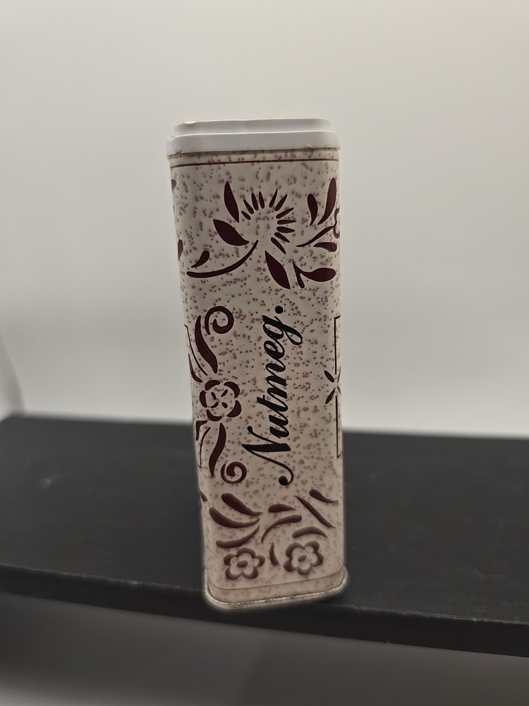 Vintage Rawleigh's Nutmeg 2.5 oz spice tin,