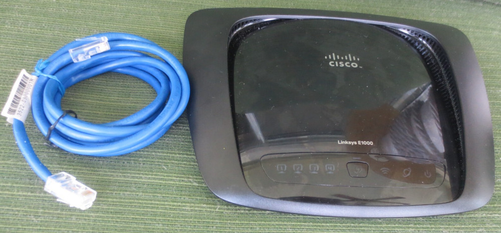 CISCO LINKSYS E1000 4 PORTS + INTERNET