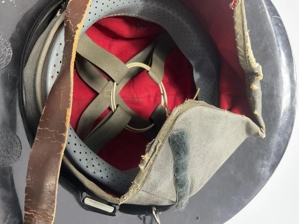 Black Firefighter Helmet front shield marked 'MEMBER 33 EVFC.