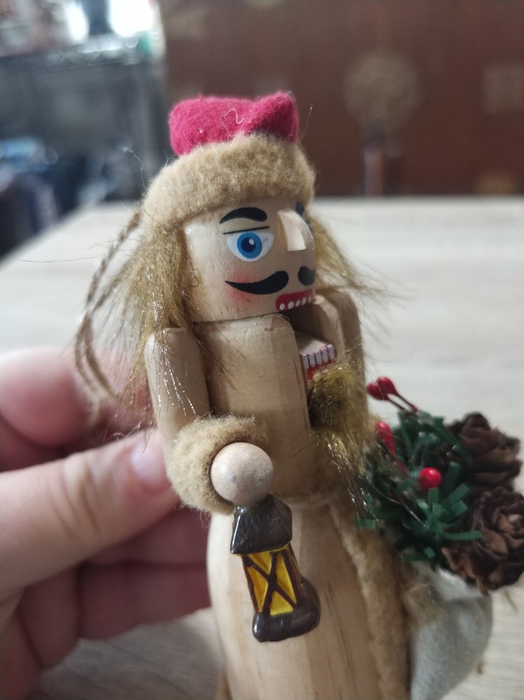 Handcrafted, painted wood Christmas nutcracker ornament