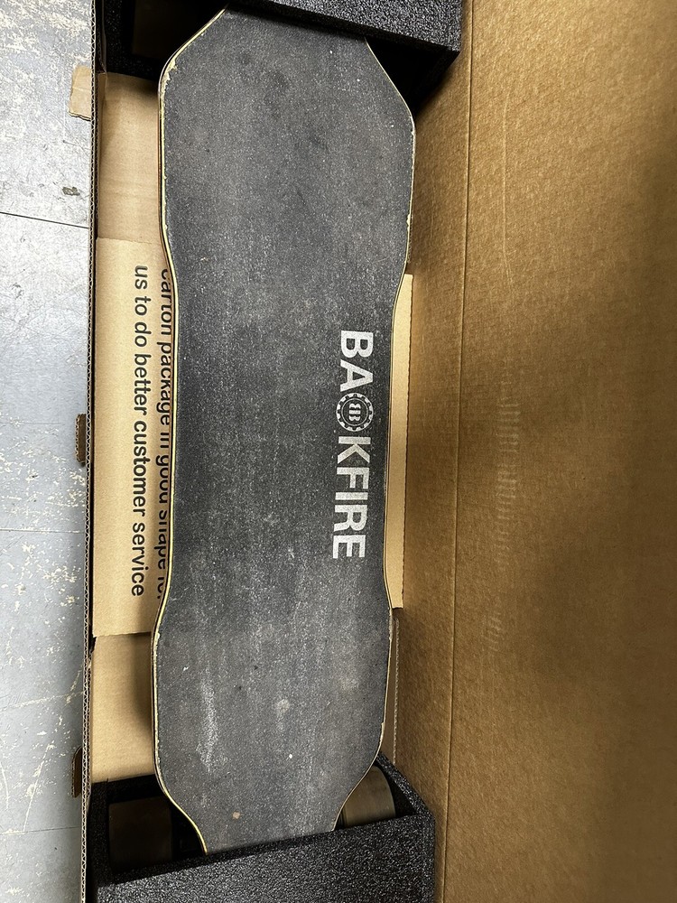 Backfire G2 Black Electric Skateboard With Extra Wheels, Charger & Remote