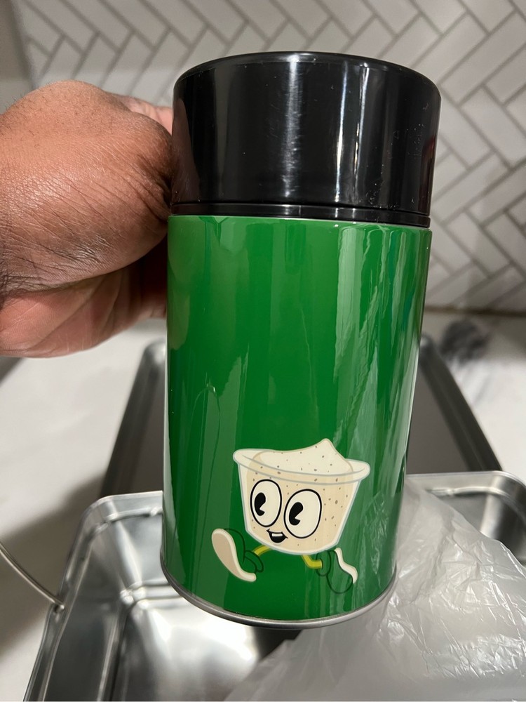 Wing-stop lunch box with drink flask.