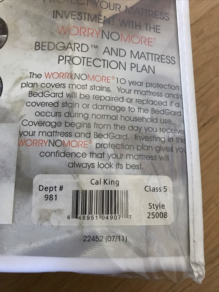 Cal King Mattress Protector. High quality, thin, new in package