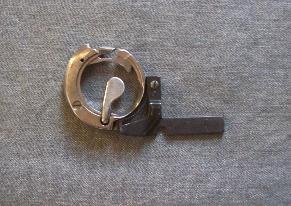 Singer Touch & Sew 648 Sewing Machine Bobbin Case, Position Bracket & Misc Parts
