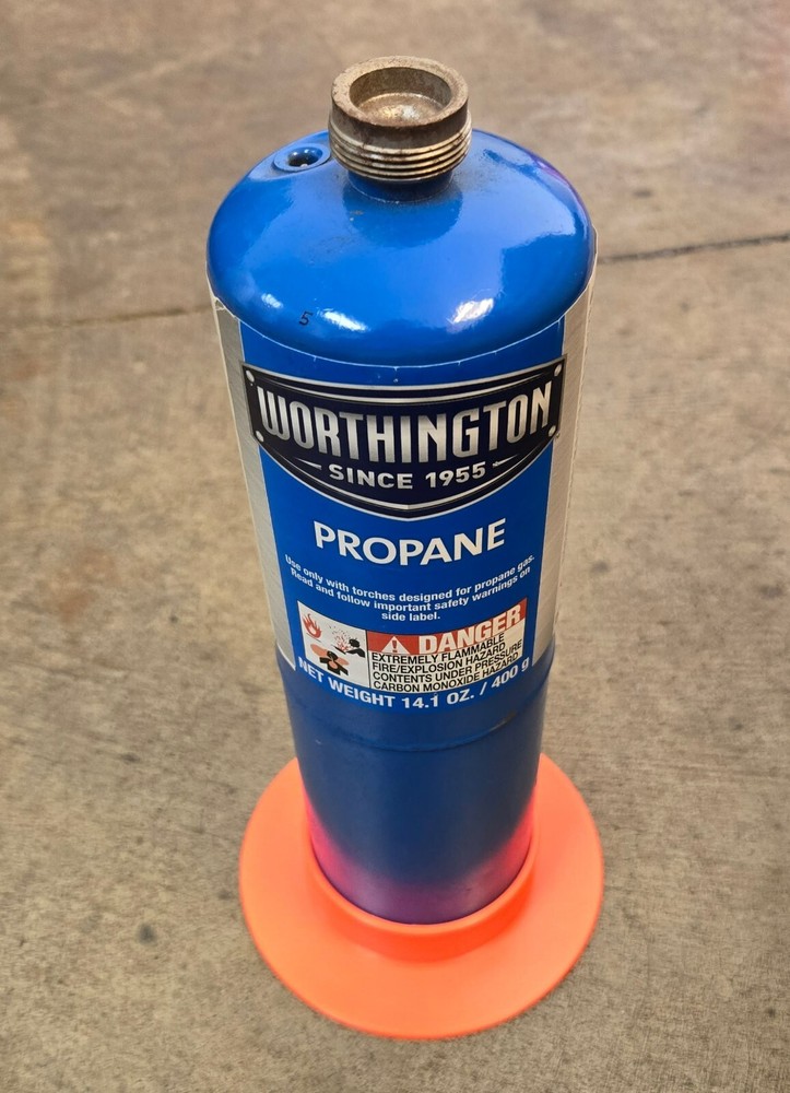 Anti-tip base for torch bottle