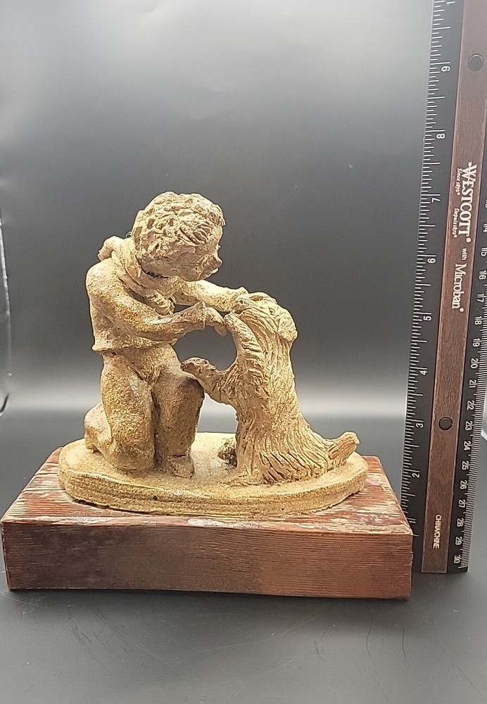 Boy And Dog Clay Sculpture