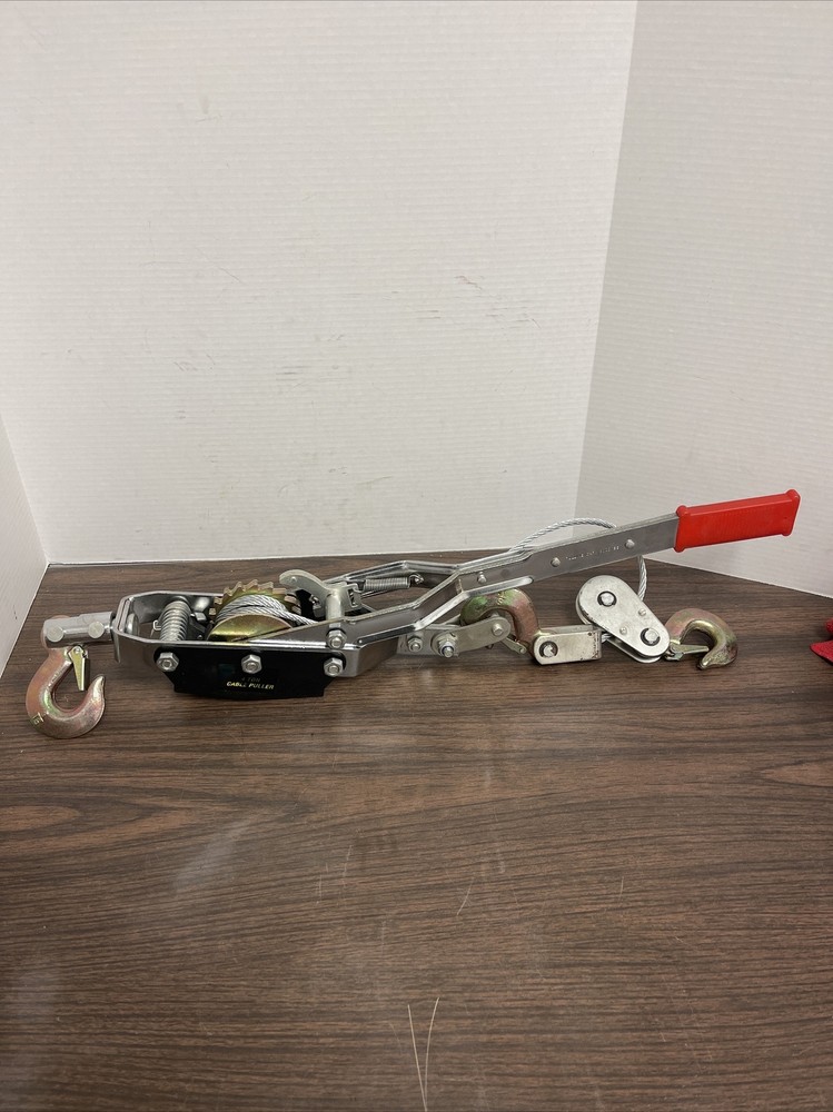 Haul Master P/N 00543. 8,000 Lbs. Cable Winch Puller
