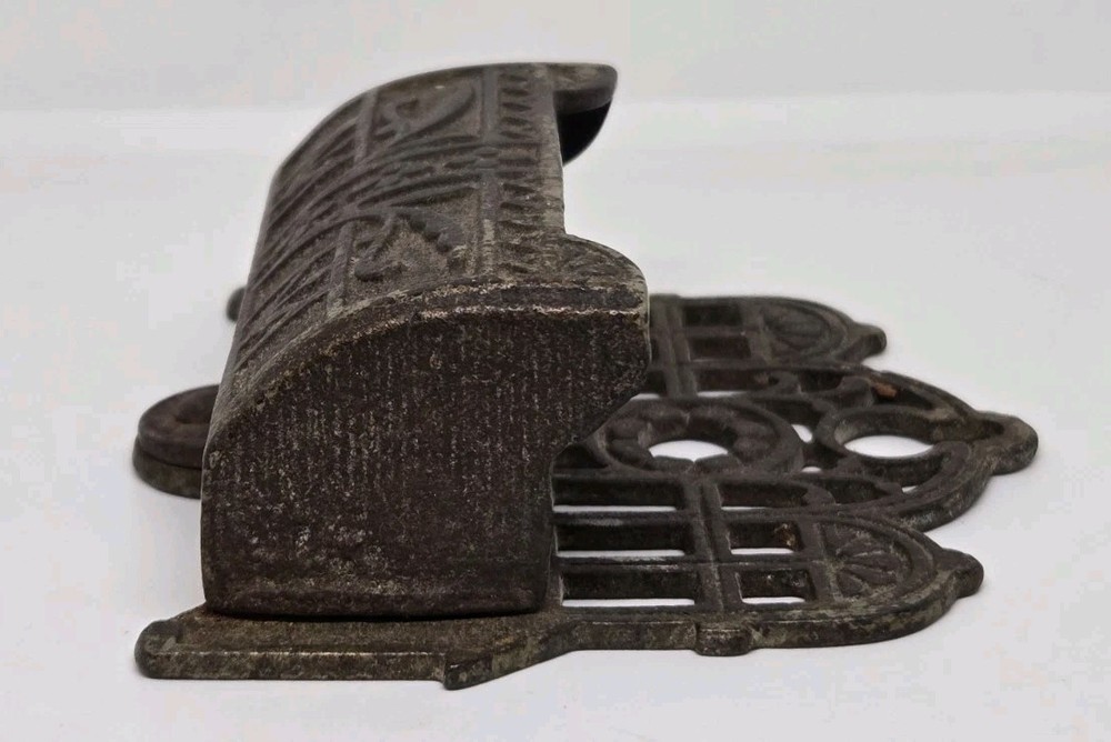 VINTAGE CAST IRON MATCH STRIKER