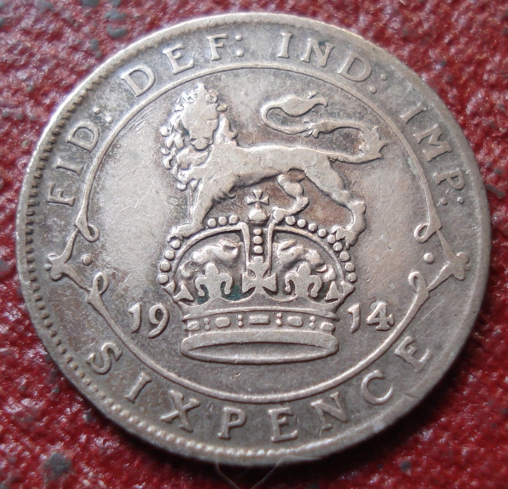 1914 BRITISH SIX PENCE IN VG CONDITION