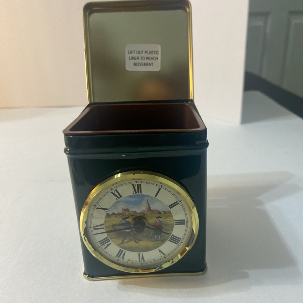 VINTAGE ROGER LASCELLES CLOCK IN TIN CAN