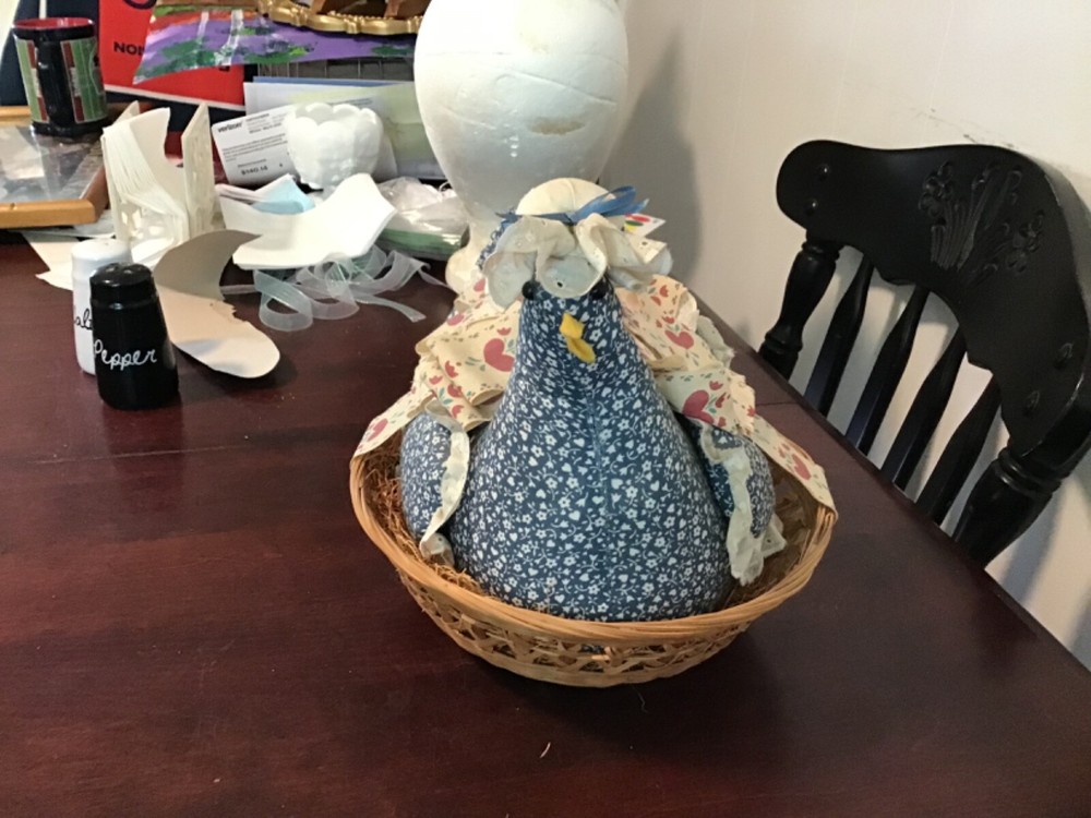 chicken pin cushion in a basket