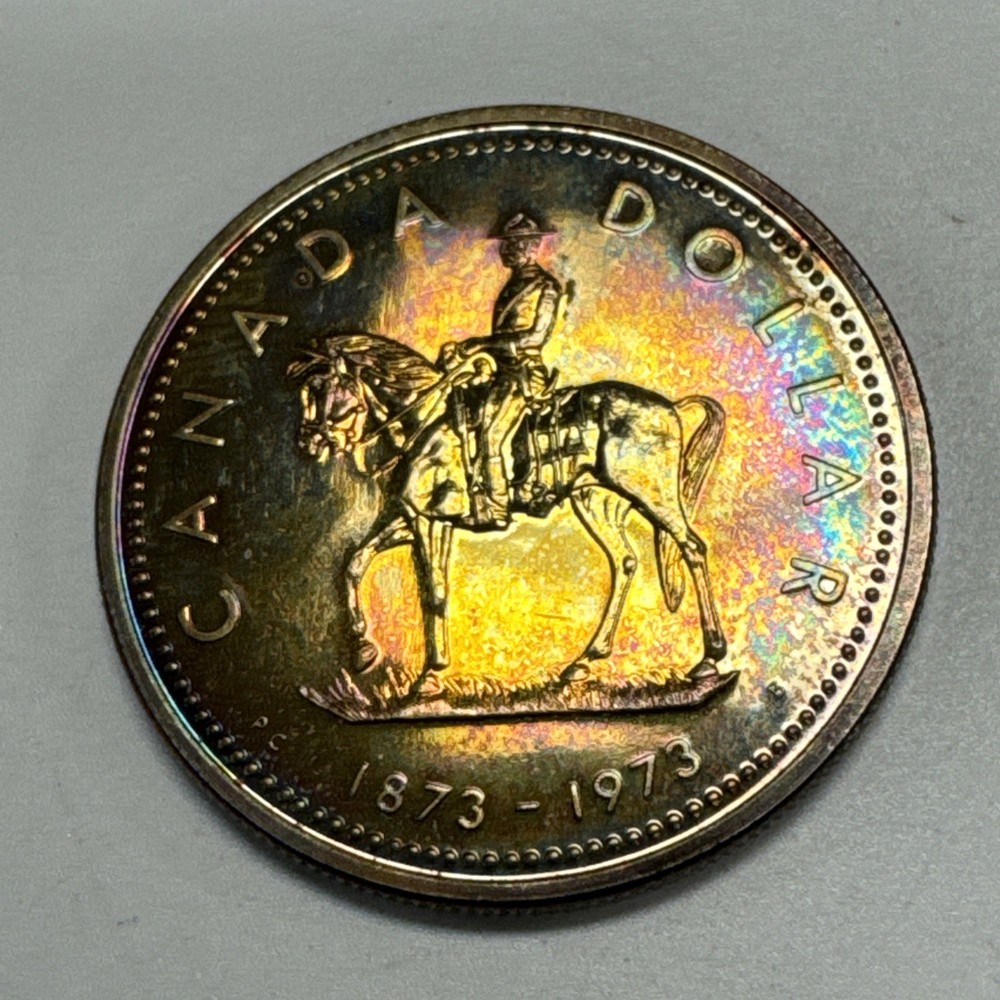 1973 Canada $1 Silver Dollar RCMP Rainbow Toning