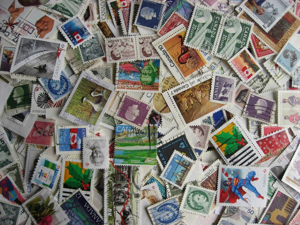 Canada colossal mixture (duplicates,mixed cond) 2000 laid out35%comems,65%defins
