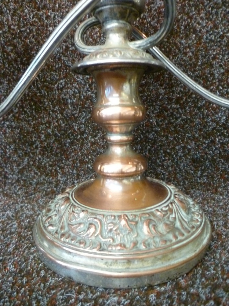 THREE VICTORIAN SILVER ON COPPER CANDLESTICKS, TWO STICKS AND ONE CANDELABRA