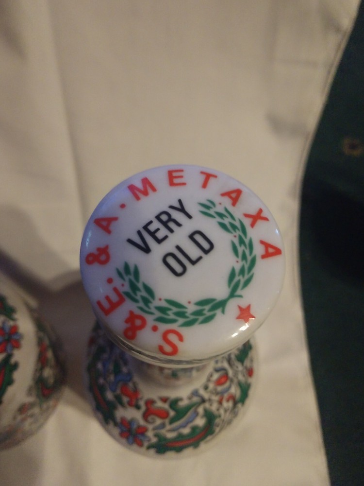 2 Vintage Metaxa liqueur decanters.