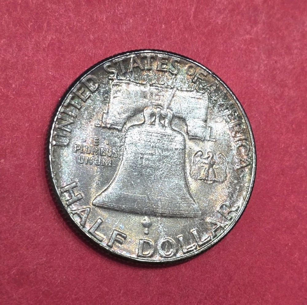 1957 Franklin Half Dollar Nicely Toned, Full Bell Lines.