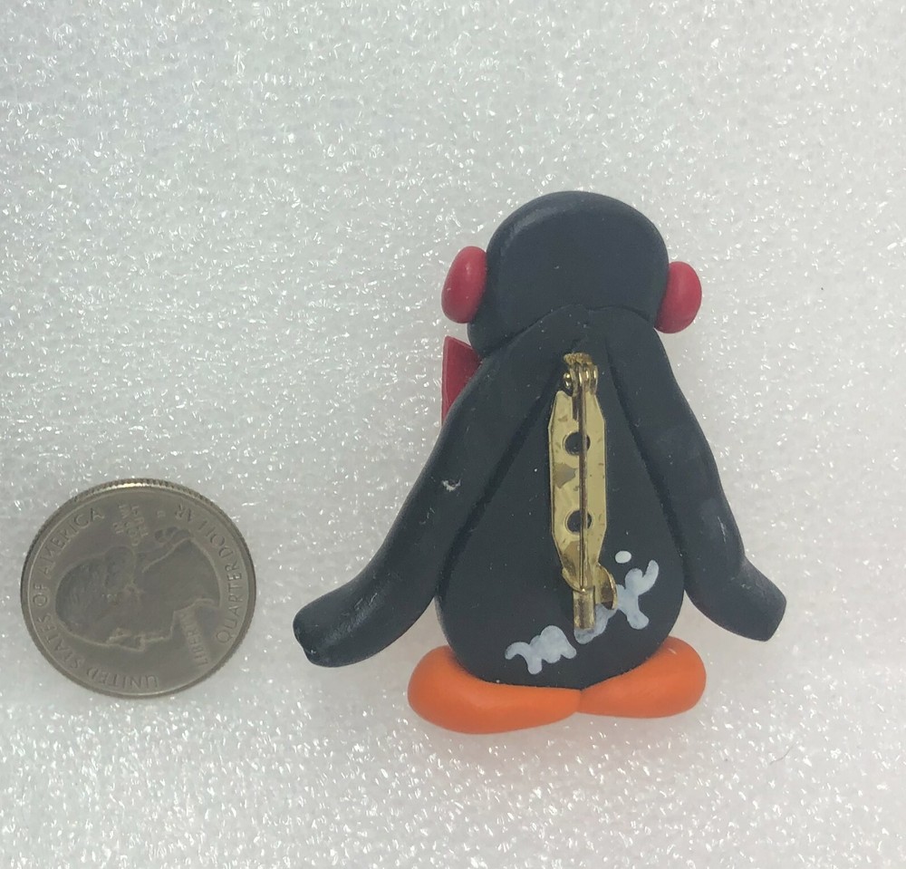 Penguin Wearing Red Bowtie & Earmuffs Plastic Pin