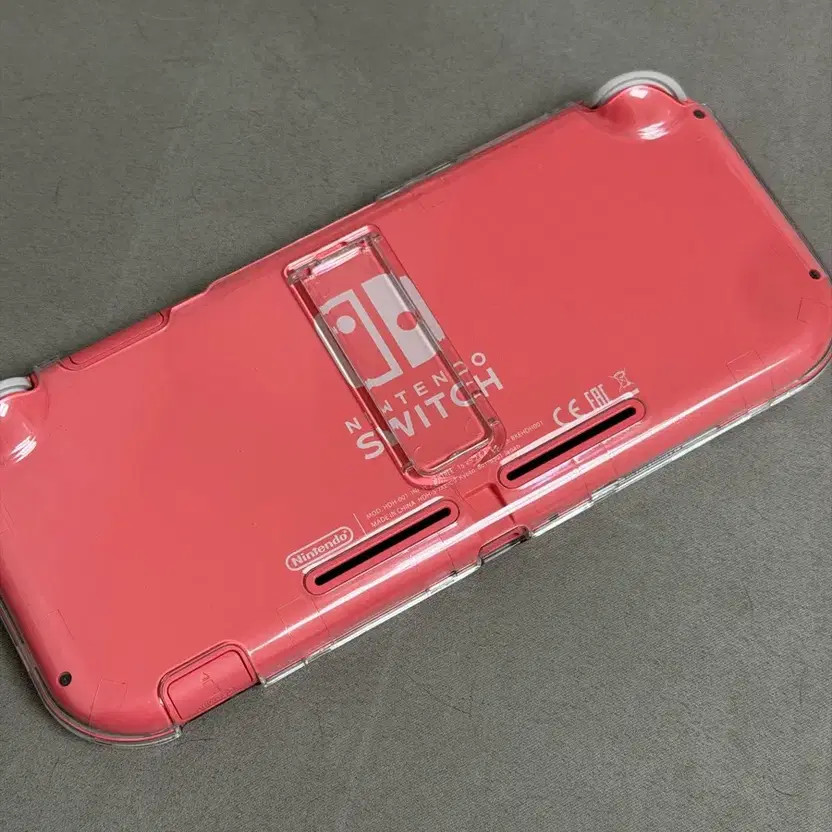 Nintendo Switch Lite Coral Unlocked with Screen Protector Official