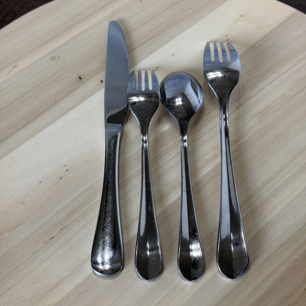 4 pc set Gourmet Settings CELEBRATIONS GS Stainless Flatware center ridge