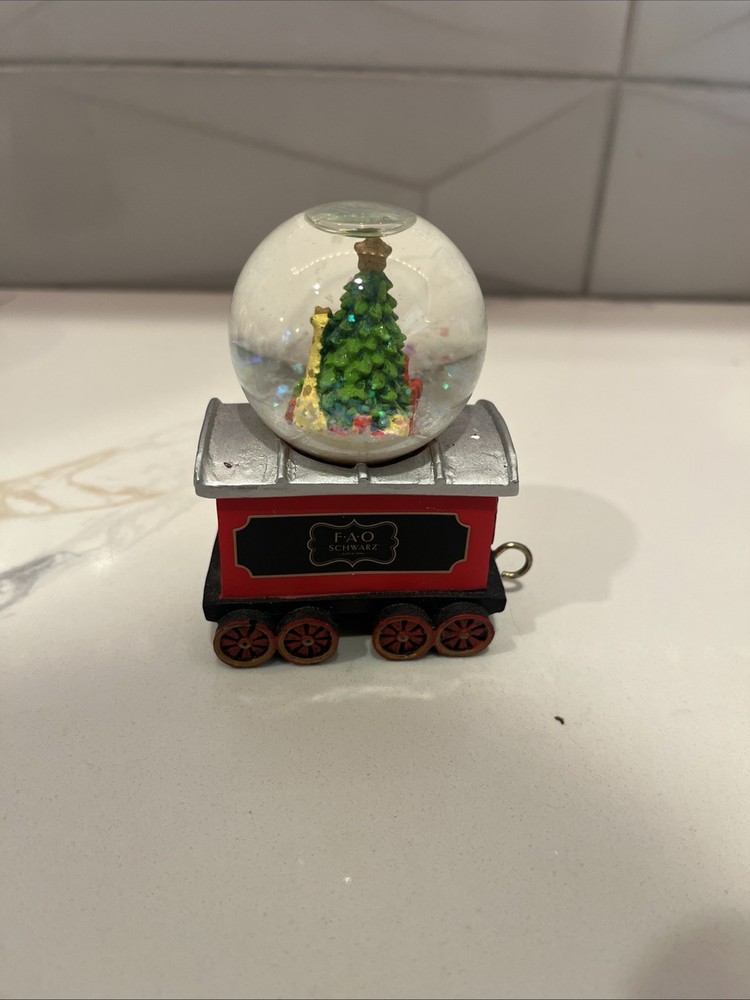 F.A.O SCHWARZ 4- piece Train Snow Globe Set