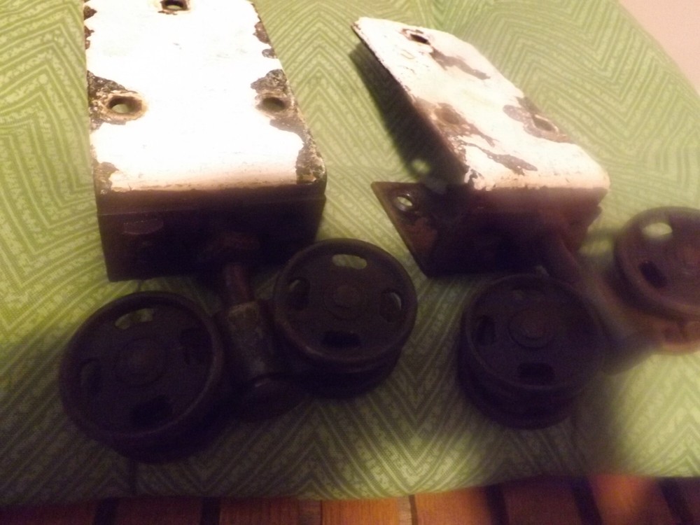 Antique barn door rollers (pair) good working order 