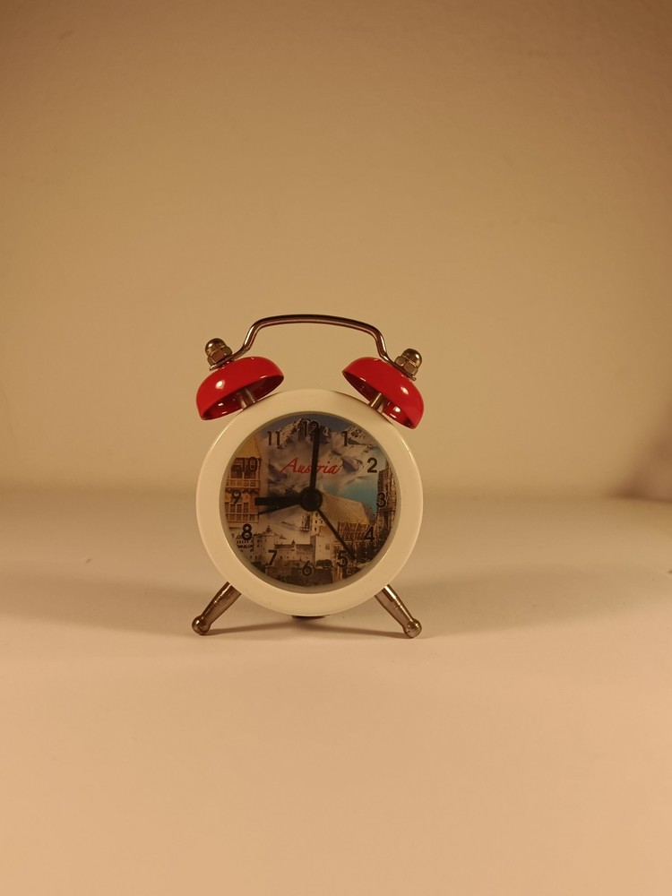 Clock with Austrian motifs and alarm clock