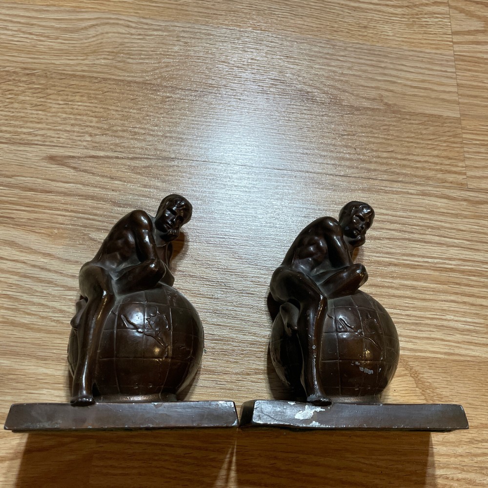 vintage book ends man on earth