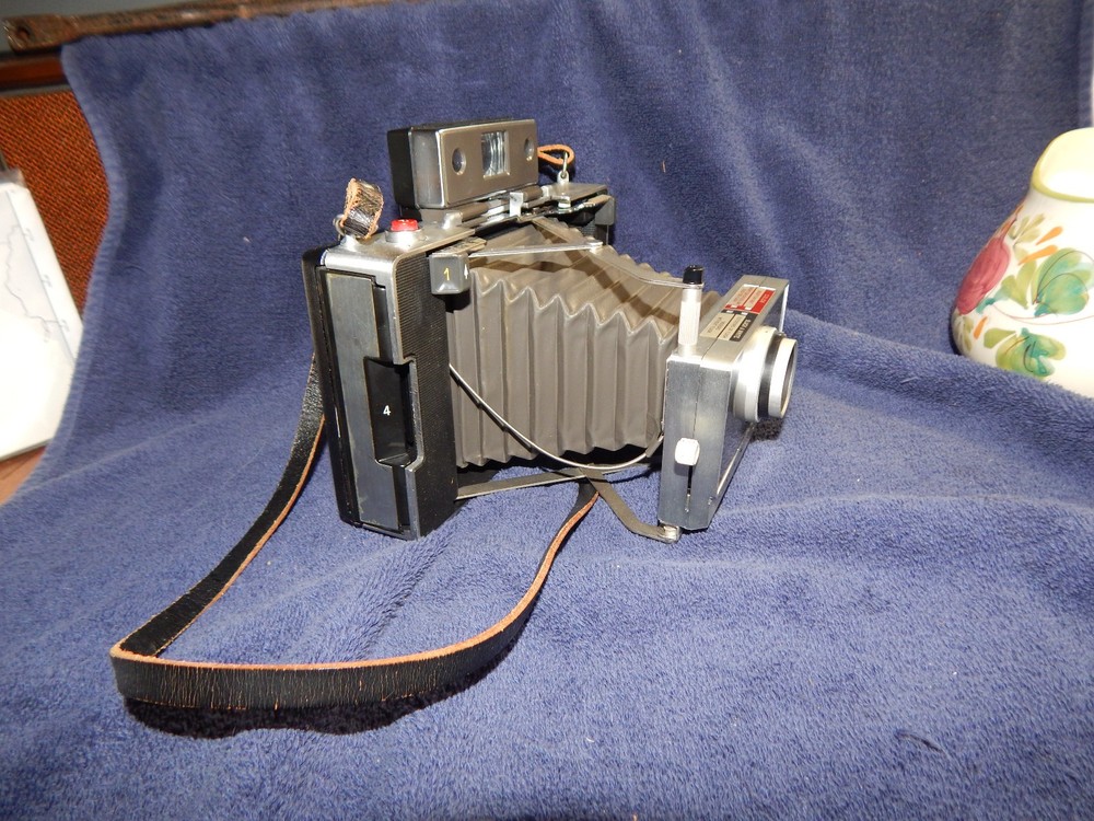 Polaroid Land Camera Automatic 100 with Manual and Hard Case Leather Neck Strap