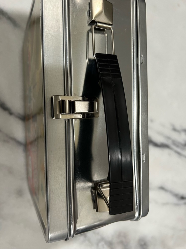 Wing-stop lunch box with drink flask.