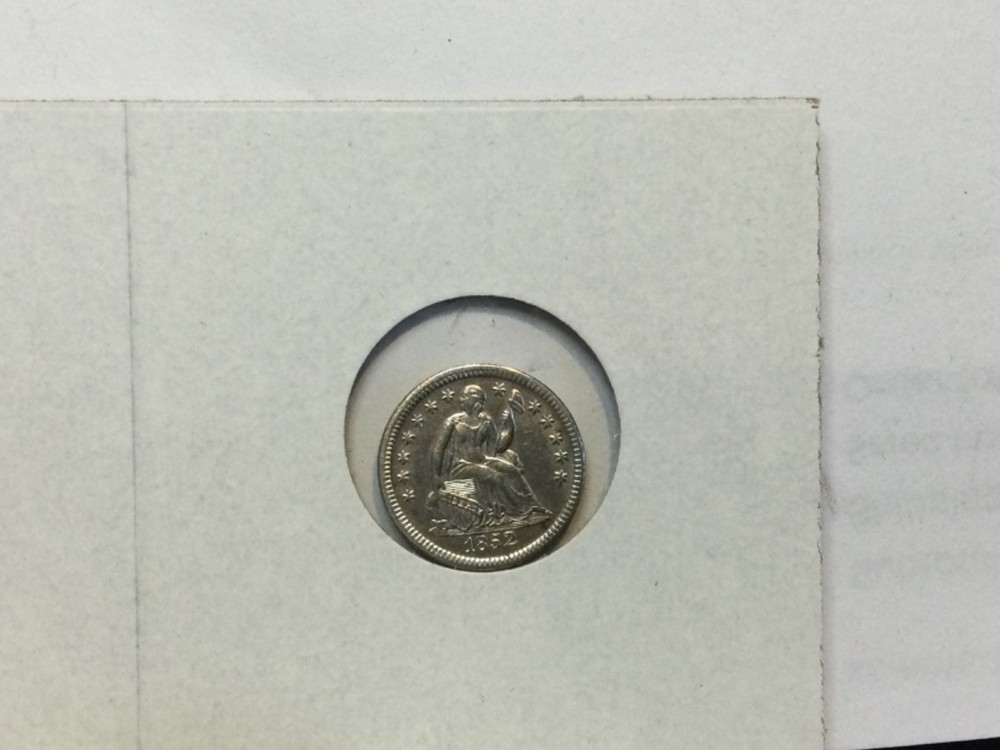 1852 seated half dime in almost uncirculated
