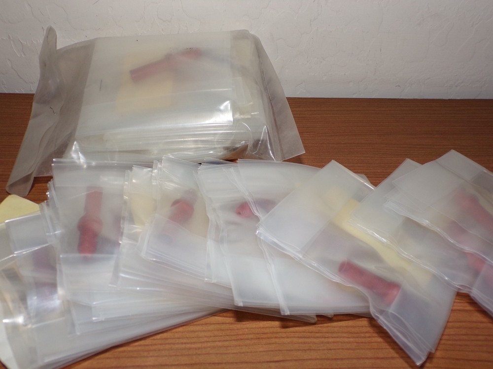 WE565 Red Grommets (QTY 15)