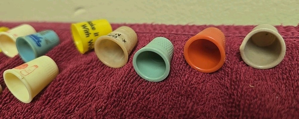 17 Plastic Thimbles 15 Have Advertising On Them