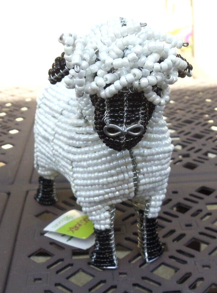 Beaded land: White sheep
