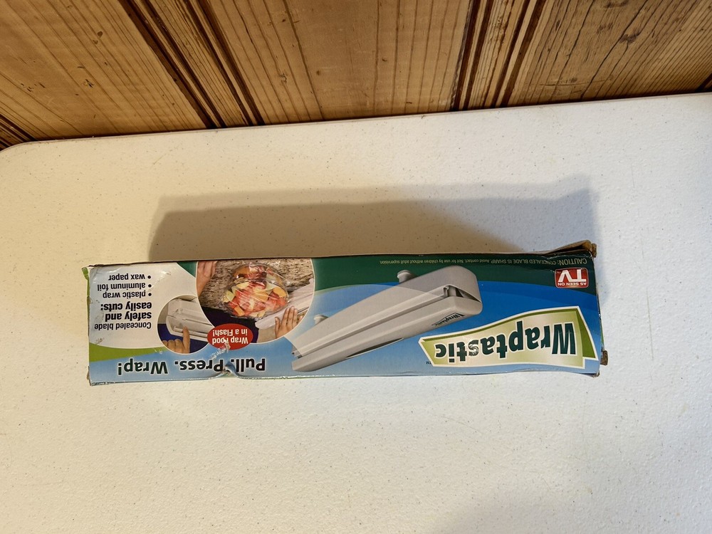 WRAPTASTIC Plastic Wrap Dispenser Pull, Press- As Seen on TV unused F1