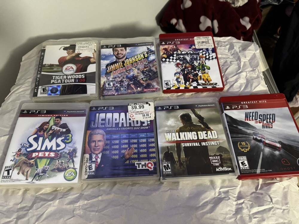 ps3 games bundle (console, 2 Wireless Controllers, and 7 Games. Gently Used.
