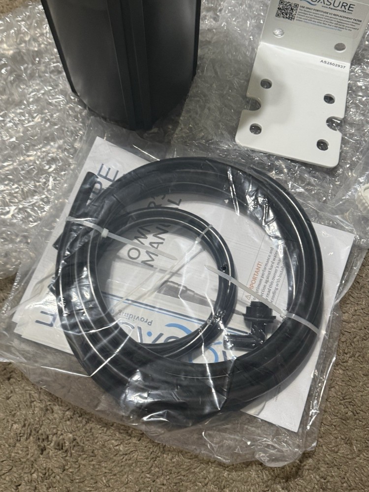 AQUASURE REPLACMENT FILTER CANSITER AND MOUNTING BRACKET AND HOSE TOOLS ETC.