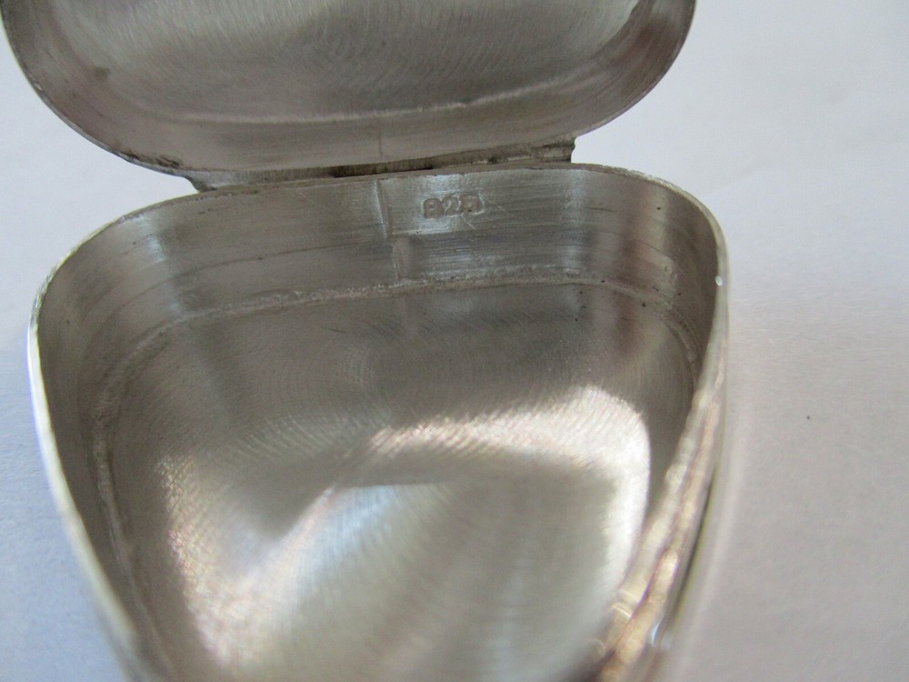 Sterling silver pill box triangle shape engraved with a flower on top hallmarked