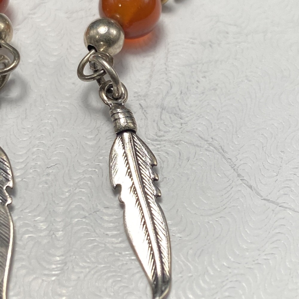 Shube’s Manuf. Sterling Silver Bear Feather Dangle Earrings