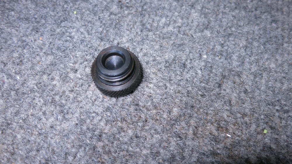THOMPSON CENTER, .50 CAL, BLACK DIAMOND MUZZLELOADER STRIKER END CAP, VG USED.