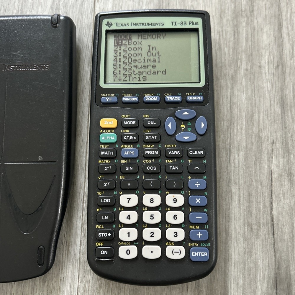 Texas Instruments TI-83 Plus Graphing Calculator w/cover. Tested Working