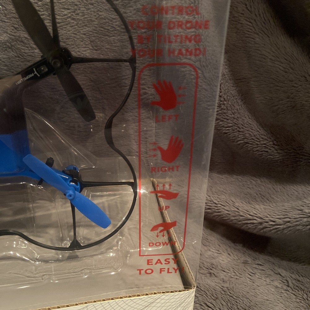 NIB Sharper Image Single Hand Controlled Stunt Drone Rechargeable LED Lights